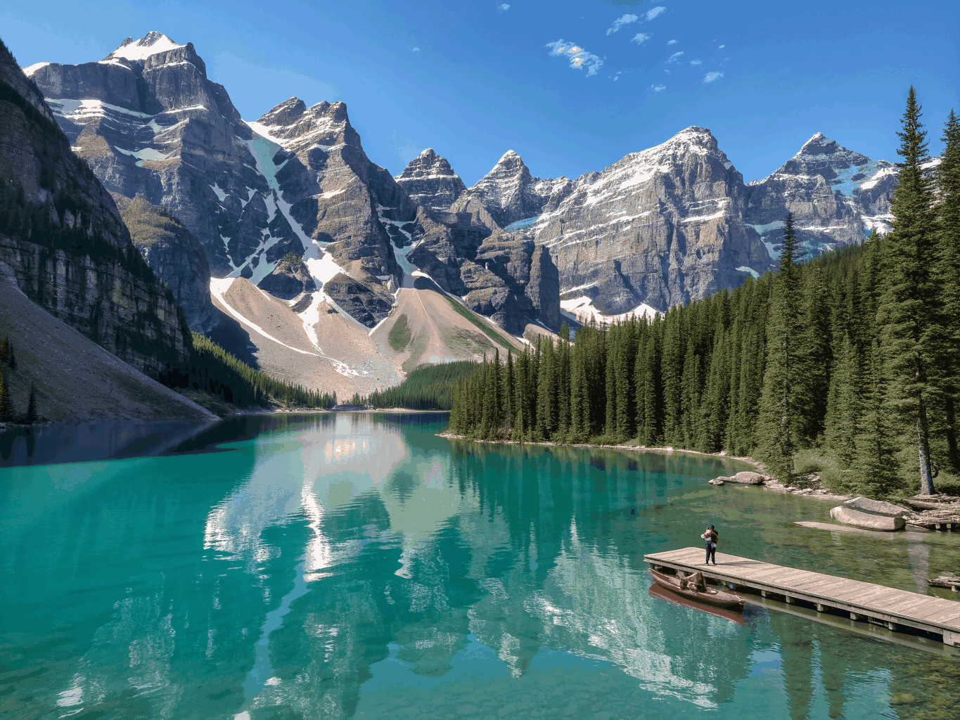 Glacial turquoise waters of Lake Louise in Banff Canadian Rockies