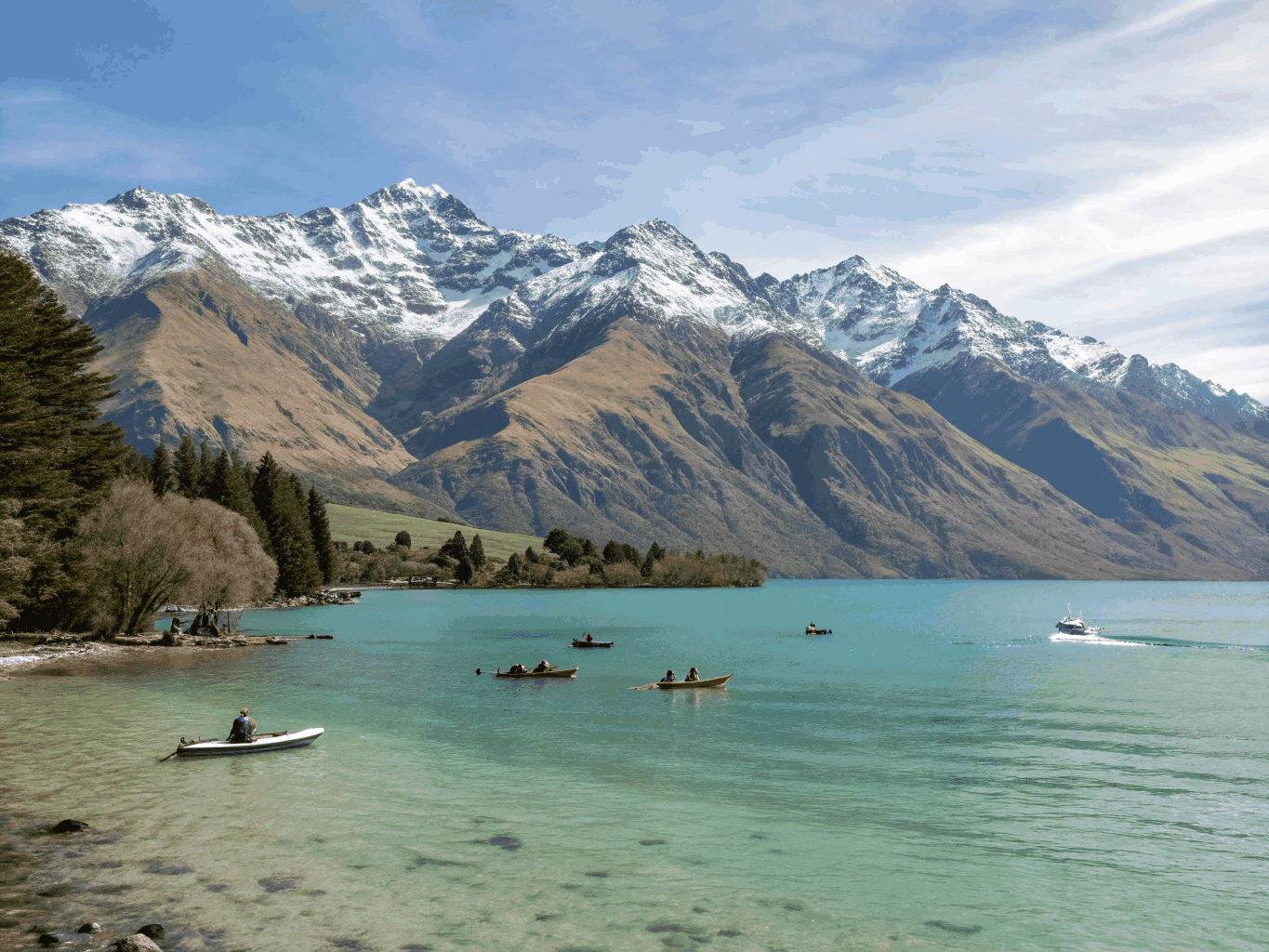 Alpine peaks reflecting in the calm waters of Lake Wakatipu Queenstown